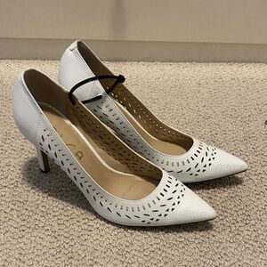 Unisa Elegant White Cutout Heels